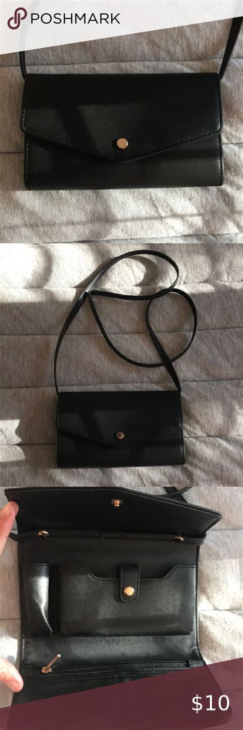 black clutch with shoulder strap.